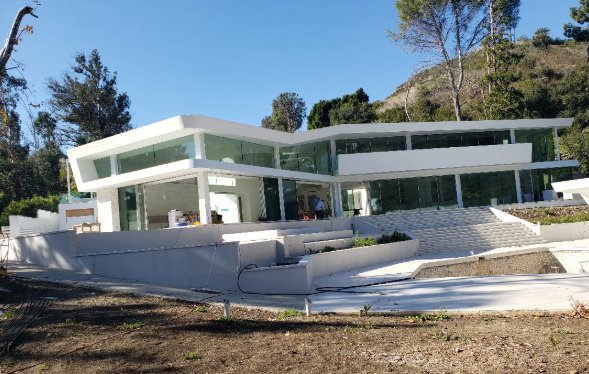 Modern hillside glass villa