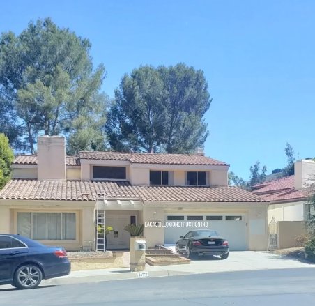 Spanish-style home with terracotta tile roof
